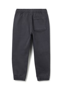 Dunkelgraue Baumwollhose mit einem elastischen Bund, schmal zulaufenden Beinen und einer einzigen Gesäßtasche. Glatte Textur mit genähten Nähten.