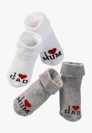 Set of four infant socks: two white with red hearts and "I LOVE MUM" and "I LOVE DAD" text; two gray with similar text and heart design.