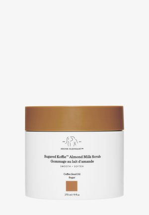 White cylindrical container with a brown lid. Text on the front includes product name, ingredients, and volume. Simple design, no patterns.