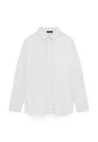 Camisa blanca de manga larga hecha de tejido ligero, con un cuello clásico y un corte relajado. Textura suave y sin estampados.