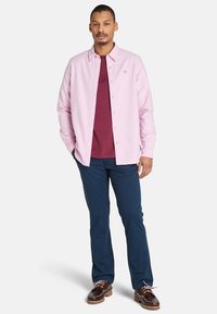 Timberland SHORT SLEEVE - T-shirt med print - burgundy