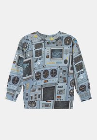 Sweatshirt avec un motif intégral représentant des instruments de cockpit d'avion détaillés, des jauges, des écrans, des boutons et des cadrans dans des tons bleu-gris.