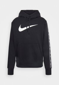 Felpa nera in cotone con tasca frontale a marsupio, cappuccio regolabile con cordino e logo Nike bianco sul petto. Dettagli bianchi lungo le maniche.