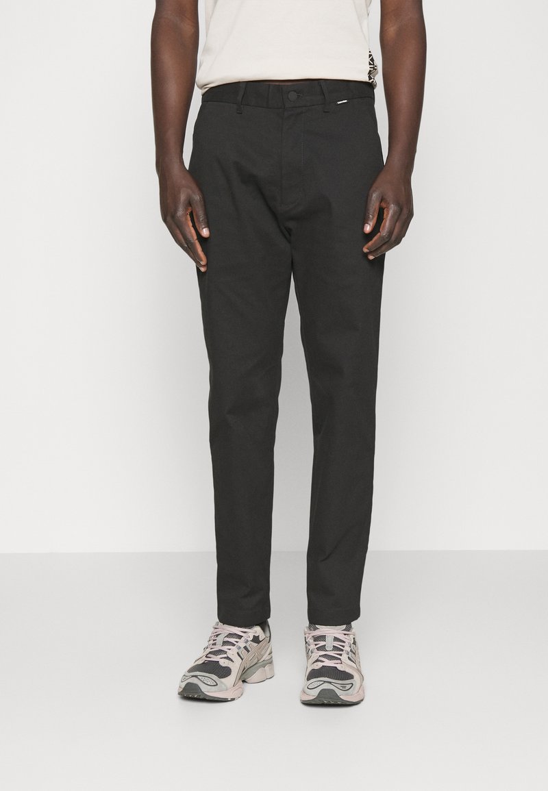 Calvin Klein MODERN TAPERED PANT Chinos black Zalando.ie