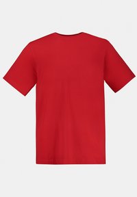 Rød bomuld t-shirt med rund hals og korte ærmer. Har en glat overflade og et simpelt, ensfarvet design.