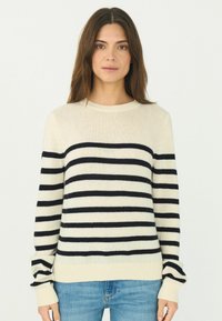 Gemusterter Pullover in Creme mit horizontalen Streifen in Marineblau. Verfügt über einen runden Ausschnitt sowie gerippte Säume und Bündchen. Weiche Textur.