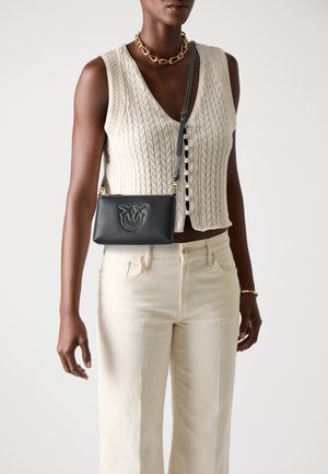 FLAT HORIZONTAL MINI SETA LOGO RILIEVO - Cross body bag - black/antique gold-coloured