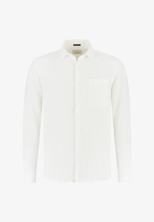 Hosszú ujjú, fehér, gombos ing mellzsebbel és klasszikus gallérral, texturált anyagból készült.