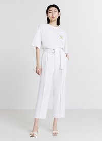Calliope TINTA UNITA - Pantaloni - bianco ottico