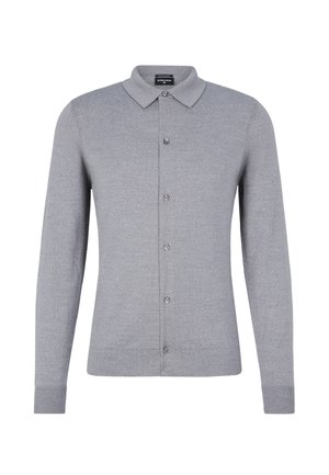 Grijze langemouwen polo gemaakt van zacht materiaal, met een kraag en een knopenfront. Ribgebreide manchetten en zoom voor een aansluitende stijl.