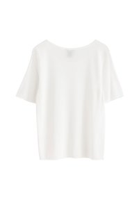 Top bianco a maniche corte con vestibilità rilassata, scollo rotondo e texture liscia, che offre un design minimalista adatto per essere sovrapposto.