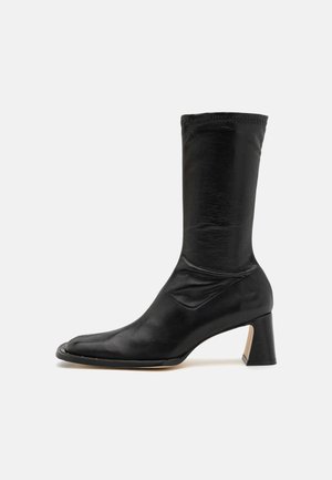 MIISTA CHASITY BOOTS - Boots - black