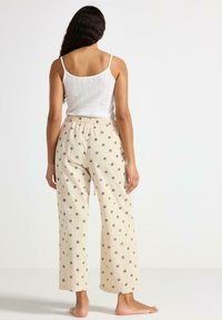 Lindex Pyjamahousut/-shortsit - light beige