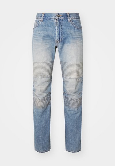 Heledad hall denim püksid erineva pesuga, millel on eristuv ribakujuline tekstuur detailid põlvede kohal ja sirge jalgade lõige.