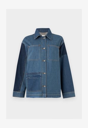 Button-up denim jacket with patch pockets, contrasting dark denim sleeves, and raw hem detail on lower left pocket.