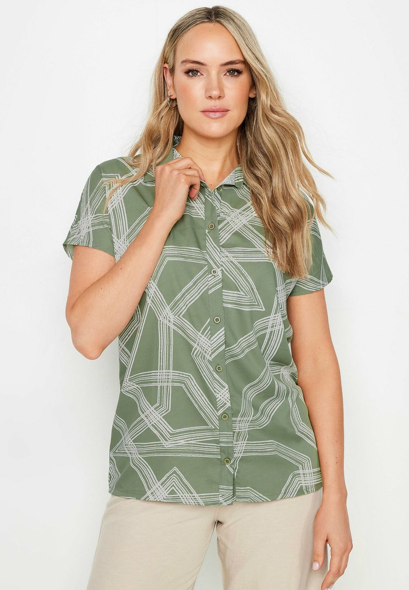 Korte mouwen, groene knoopshirt met abstract wit lijnpatroon. Met kraag ontwerp en een gladde textuur, voorzien van een rechte snit en subtiele knopen.