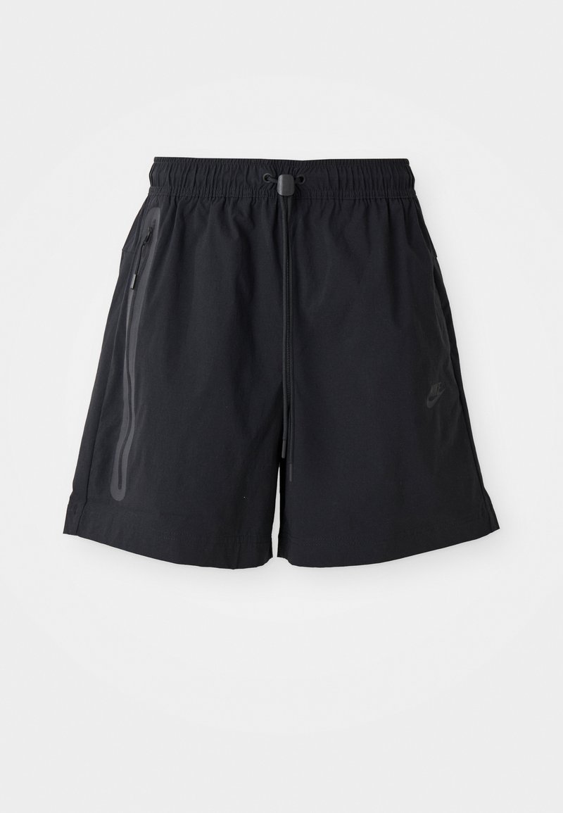Black shorts with an elastic waistband, adjustable drawstring, and two side zip pockets. Features smooth fabric and a subtle logo accent.
