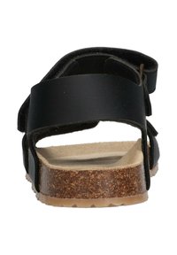 Černé sandály s širokými popruhy a nastavitelným zapínáním, korková stélka, gumová podrážka, strukturovaný základ a hladká stélka.