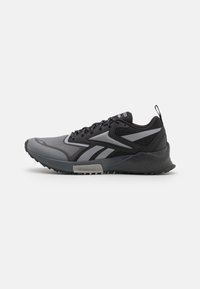 Scarpe sportive nere e grigie con tomaia in mesh e sintetico, dotate di una suola testurizzata, lacci prominenti e logo Reebok.