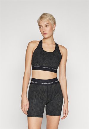 New Balance MEDIUM SUPPORT SLEEK PRINTED PACE BRA - Reggiseno sportivo con sostegno medio - black multi