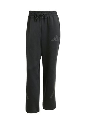 Sorte sweatpants lavet af blødt stof, med en elastisk talje og snoretræk samt en diskret logodetalje på siden.