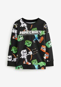 T-shirt noir à manches longues avec un design graphique coloré inspiré de Minecraft, comportant des personnages et des icônes comme des creepers et des TNT dans des positions variées.