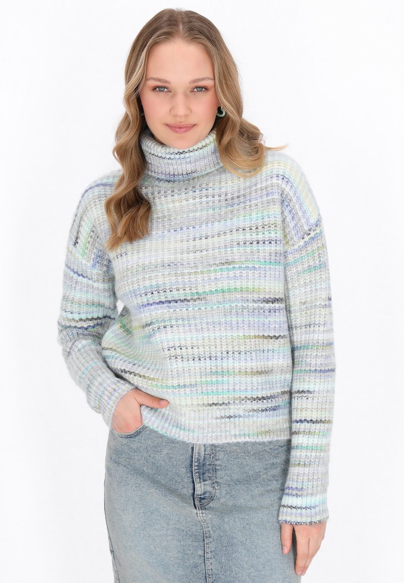 Gebreide coltrui met een multicolore gestreept patroon in pastelkleuren. Zachte textuur met geribbelde manchetten en een losse pasvorm.