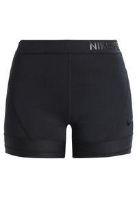 Shorts de compression Nike Pro noirs avec une taille haute et des détails subtils du logo sur la taille et le bas de la jambe.