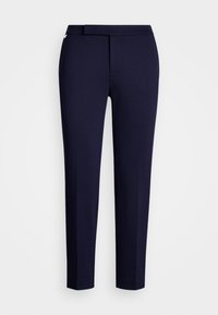 Navy blue trousers in a fitted design, made from smooth fabric, featuring a waistband and tapered legs with no visible pockets.
