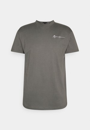 T-shirt grigia in cotone con collo rotondo, maniche corte e un piccolo disegno bianco con firma sul lato sinistro del petto. Tessuto liscio, vestibilità standard.