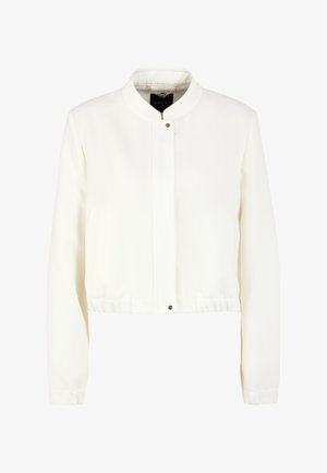White cropped jacket with a stand collar, made of soft fabric. Features a front snap closure and elastic waistband. Smooth texture.