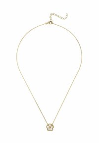 Gold-tone necklace with a floral pendant, featuring a white enamel flower design and a small gemstone center, hangs on a delicate chain.