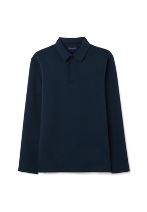 Marineblaues Polohemd mit langen Ärmeln, einem flachen Kragen, Knopfleiste und gerippten Details an Bündchen und Saum, aus weichem Baumwollmaterial gefertigt.