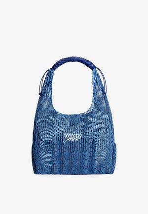 Borsa a tracolla blu intrecciata con manico avvolto e logo "tommy jeans" ricamato al centro frontale.