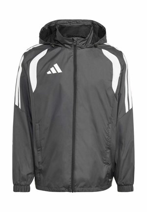 Γκρι αδιάβροχο μπουφάν με κουκούλα, με λευκές λεπτομέρειες και τρεις λευκές ρίγες στους ώμους, κατασκευασμένο από ελαφρύ υλικό.