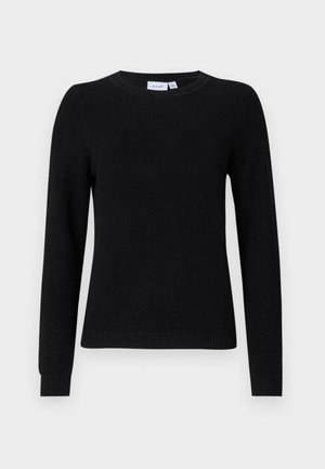 Black knitted sweater with a round neckline and long sleeves. Features a textured weave and ribbed cuffs and hem. No additional embellishments.