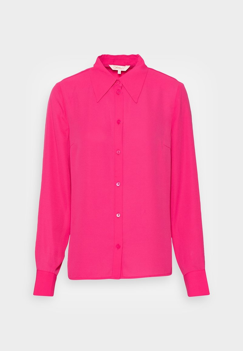 Pink long-sleeve blouse in lightweight fabric, featuring a pointed collar, button closure, and single chest pocket. Smooth texture and solid color.