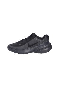 Zapatillas deportivas negras con parte superior de malla texturizada, cuello acolchado y suela de goma. Presentan sutiles acentos reflectantes y un perfil aerodinámico.