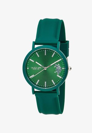 Orologio da polso verde con cinturino in gomma, indici orari argentati e logo bianco del giocatore di polo a cavallo posizionato alle ore 3.