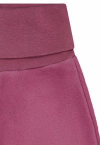 Pantaloni jogger in pile di colore rosa tenue, con ampia vita elastica e tessuto morbido e testurizzato con finitura liscia.