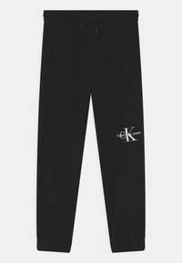 Calvin Klein Jeans MONOGRAM OFF PLACED - Träningsbyxor - ck black