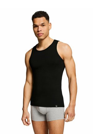 Puma, 4 PACK - Unterhemd/-shirt - schwarz weiß