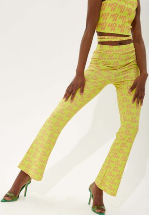 PRINTED IN - Trousers - yellow