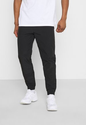 UNISEX - Träningsbyxor - black