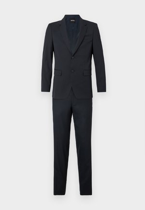 Μα navy κοστούμι δύο τεμαχίων, ραμμένο σχέδιο με εφαρμογή slim fit. Μονόκουμπο σακάκι με δύο κουμπιά, παντελόνι με ίσια γραμμή, λεία υφή υφάσματος.