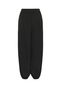 Pantalon noir à coupe ample avec taille élastique et chevilles resserrées par un élastique, présenté sur un fond blanc.