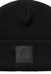 Black knitted beanie with a textured ribbed design, featuring a square fabric patch with a logo. Soft material, warm fit.
