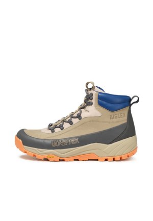 Beige and gray high-top hiking boot with orange sole, blue padded collar, black laces, marked "GORE-TEX" and "AIGLE" on the side.