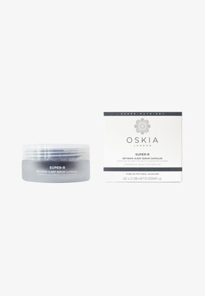 OSKIA London Super-R Retinoid Sleep Serum Kapseln im Glasbehälter und weißer Schachtel mit schwarzem Text, enthält 60 Kapseln à 0,28 ml.