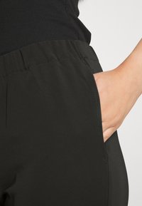 Modström PERRY PANTS - Calças - black